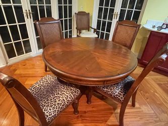 Wood table set with four chairs