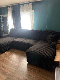 Black Sectional couch / tv stand  sillón