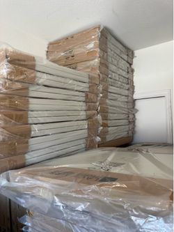 White plastic folding chairs and tables