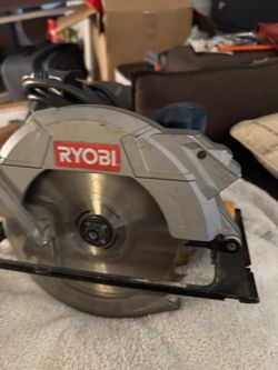Ryobi electric circular saw built in laser works great has 7 inch wood blade still quite asking 55