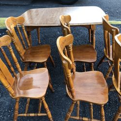 42”x59”x20”h Solid wood dining table with 6 strong chairs