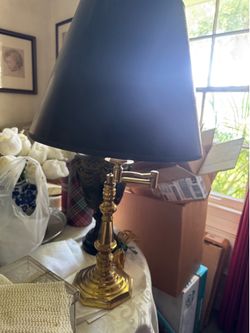 vintage brass candlestick table lamp with adjustable swing arm & black shade