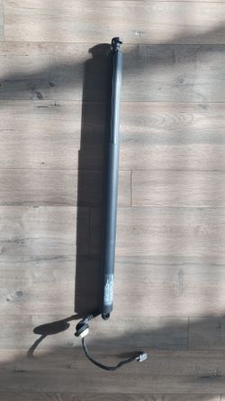 Ford explorer rear hatch strut/motor