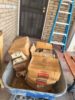 Construction material and grill