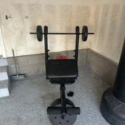 Weight Bench And Punching Bag 