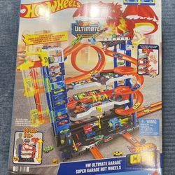 Hot Wheels City Ultimate Garage Playset w/ 2 Die-Cast Cars, Storage for 50+ Cars