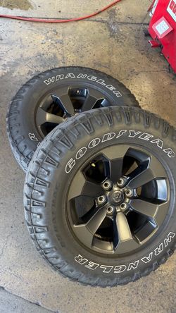 Dodge Ram Rebel Goodyear Wrangler Duratrac Tires on Black Wheels
