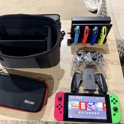 Nintendo Switch with 3 sets of joycons