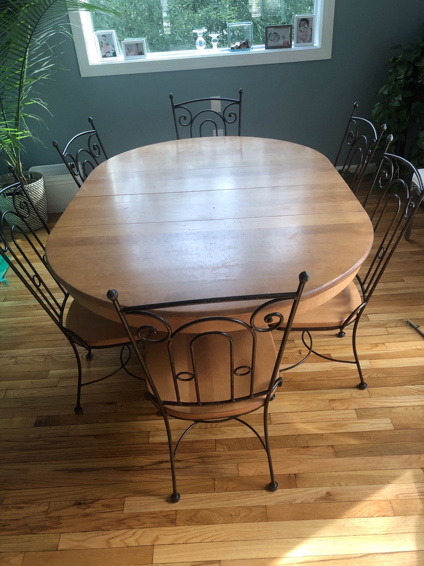 Maple and wrought iron expandable kitchen table