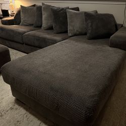 Large sectional, ottoman, and swivel chair