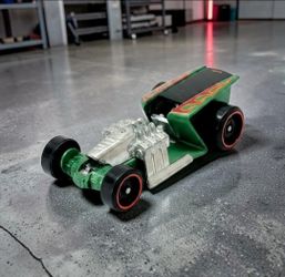 2015 Hot Wheels Green Z-Rod #166, Rod Squad Series 10/10 Die-Cast 1:64 Scale Toy.
This is a green Hot Wheels Z-Rod from the 2019 Rod Squad series. The