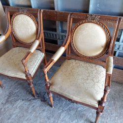 four luxurious armchairs