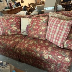 two-cushion sofa with a rust red floral upholstery- Craft Master Solid Wood Frame 84 By 39 By  36 
