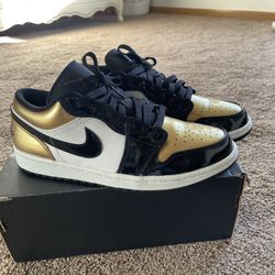 Jordan 1 Low “Gold Toe” 