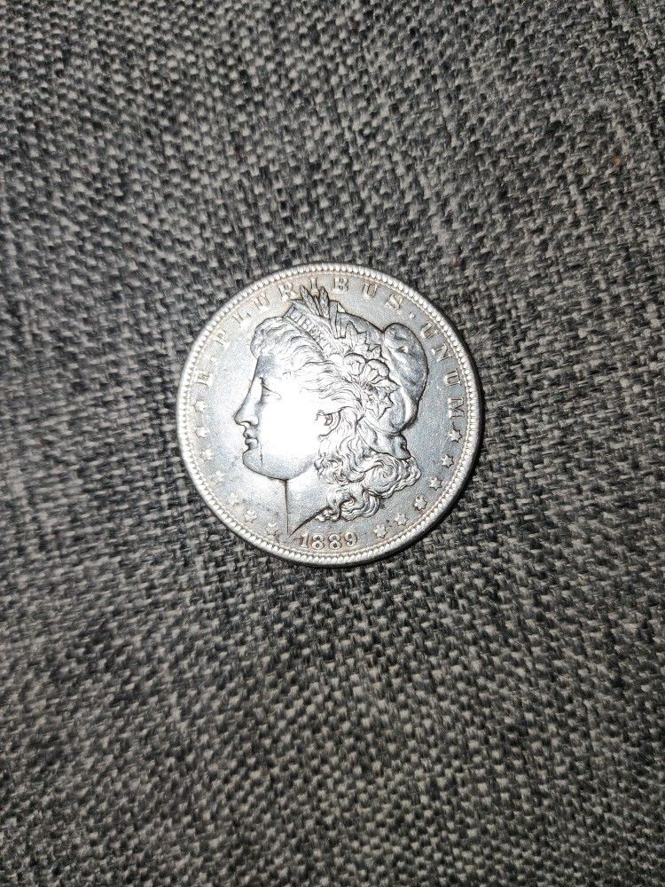 1889 Morgan Dollar Coin In AU 58 Proof