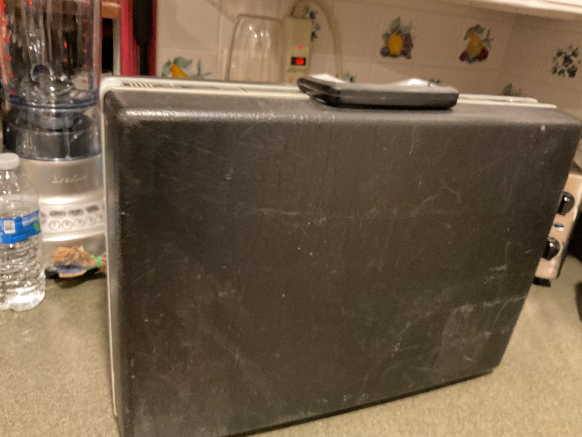 A Working Briefcase With Comportments For Work And A Nice Computer With Recipes