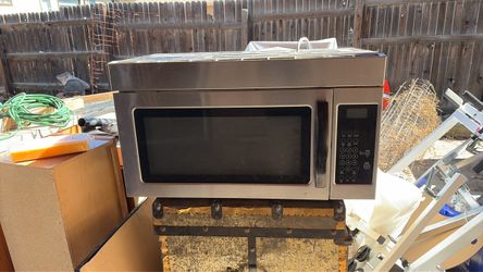 Stainless steel microwave with vent fan