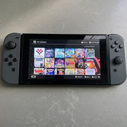 Nintendo Switch With Games & Gray Joy-Cons