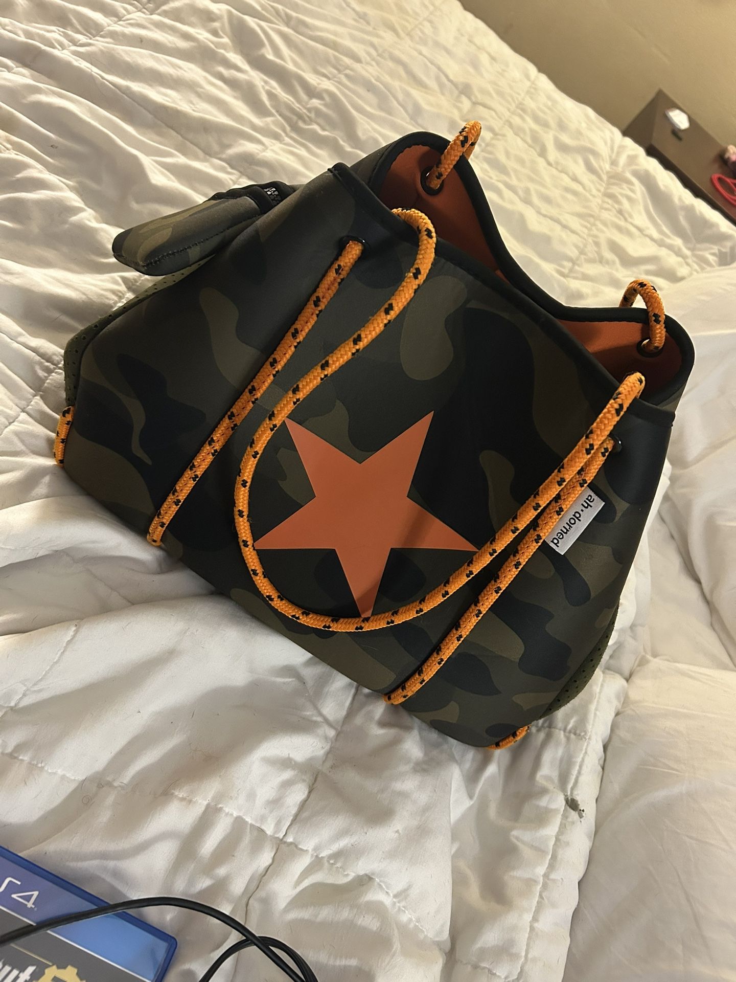 Ah-dorned- Orange Ropes & Star Neoprene Bag