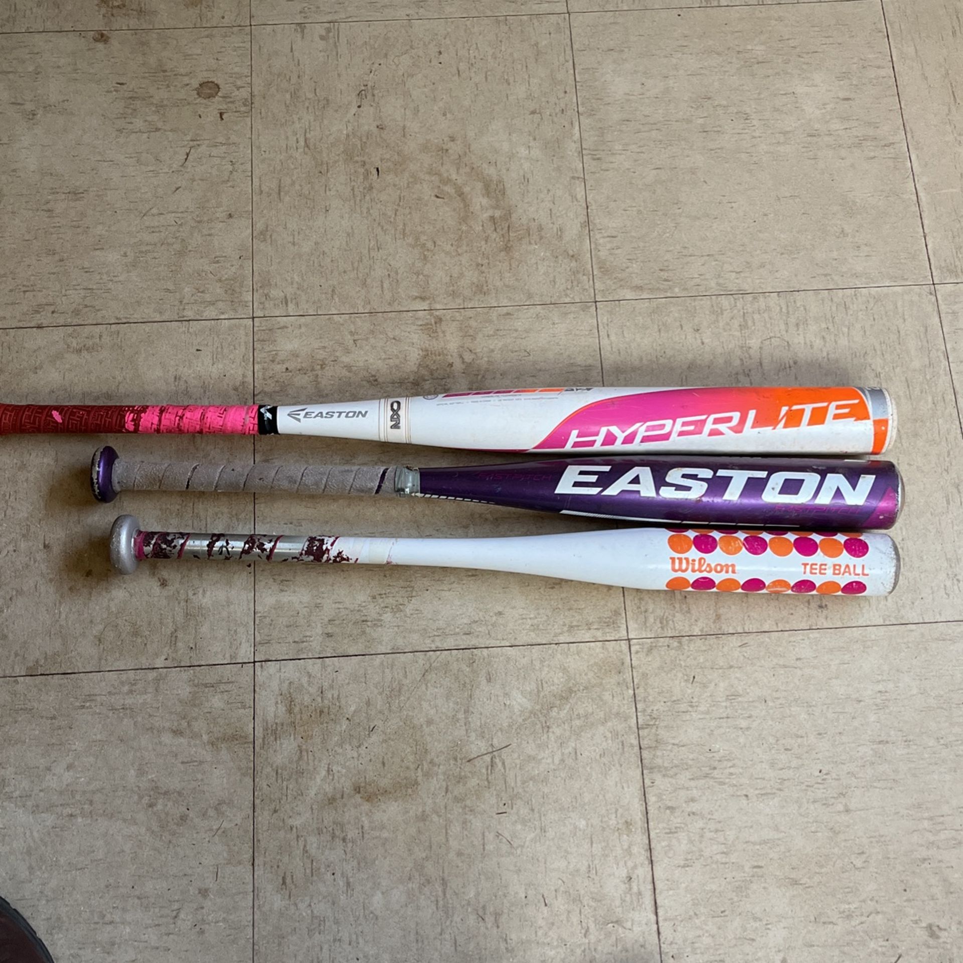 Three Aluminum Bats, One Wilson, And Two Eastons