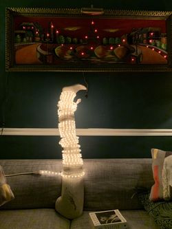 Mannequin Leg Wrapped In Light