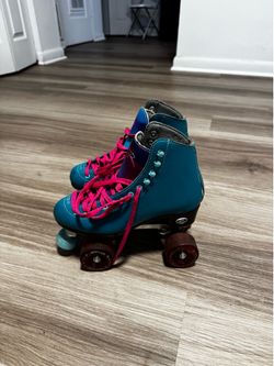 Teal and Pink Ridell Roller Skates