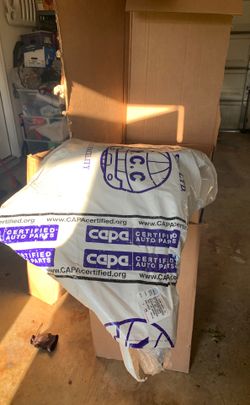 Brand new 2003 front bumper cover and left side fender