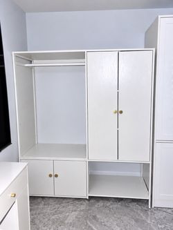 White Wardrobe Closet with Gold Knobs