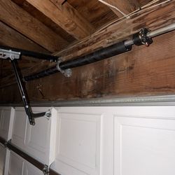 GARAGE DOOR SPRING REPLACEMENT 