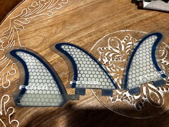 Surfboard fins