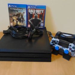 PS4 Pro 1tb 2x Controllers With 2 Games