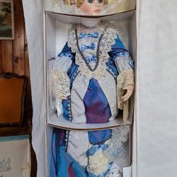 Vintage, collectible porcelain doll