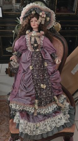 Vintage 36‑inch porcelain collector doll. Porcelain head & hands in great condition. Missing one foot and shoe. on remaining shoe. $80