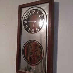 Framed Clock Mirror Showcasing Beautiful Dried Flowers