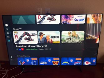 Two 65 inch Samsung TVs