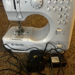 Sewing Machine + Accessories 