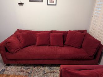 2 red Distinctions couches