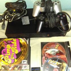 Sony ps2 Bundle 2 controllers 4 used games