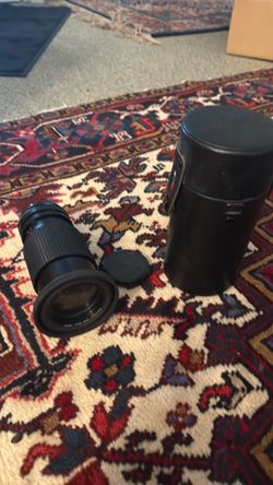 Tokina 55mm with wide angle hood and haze uv lens