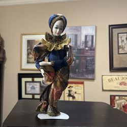 Vintage wind up porcelain doll
