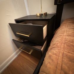 Two bedside lamps and two tables