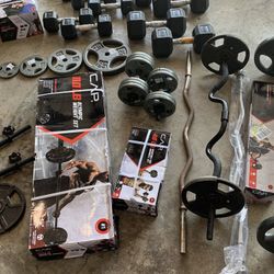 Brand New Olympic 110 Lb Weight Set and 7ft barbell 110 juego de discos olímpicos pesas