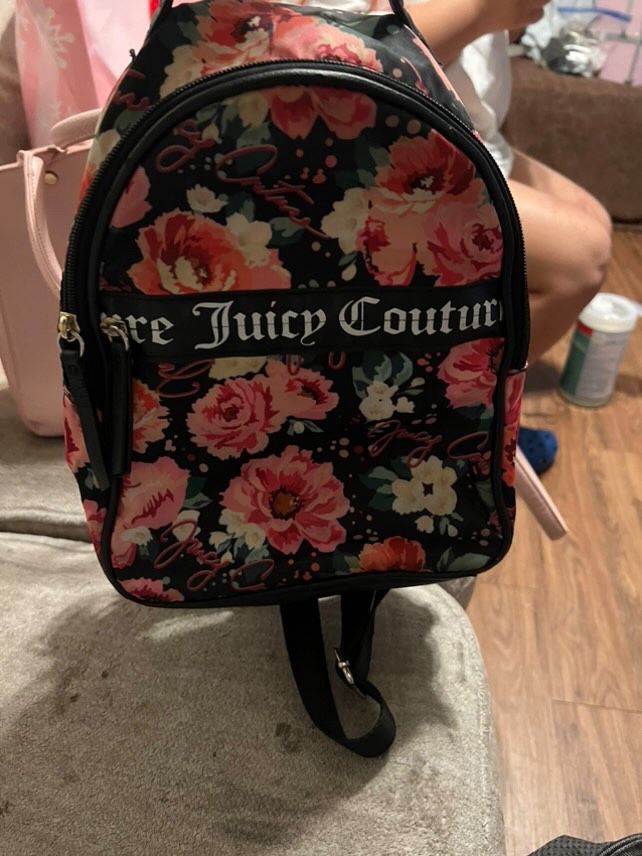 Woman’s juicy couture pink flower backpack used once good condition 15$ pick up in Ontario