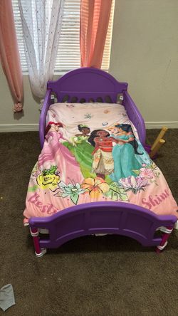 Purple little girls  bed..