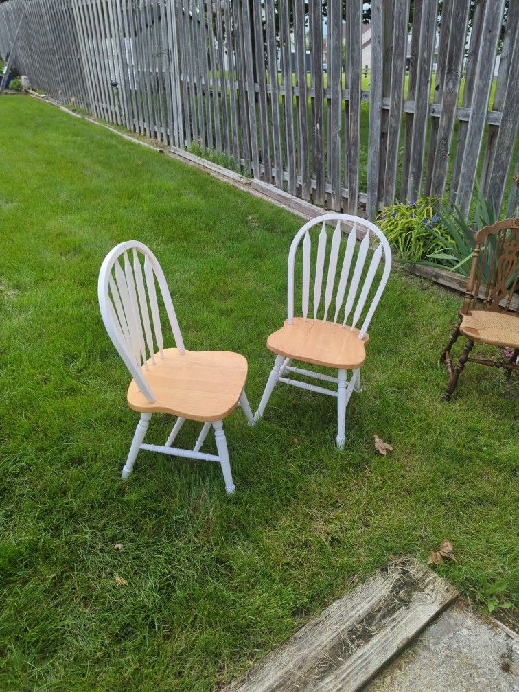 Two Hard Wood Chairs
