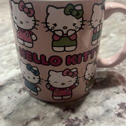 Silver Buffalo Sanrio Hello Kitty Expressions ceramic mug. 