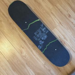 Skateboard With Holographic Detail
