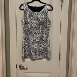 Adorable snakeskin print dress covered with clear sequence