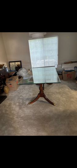Transitional Square Glass Top Table with Dark Wood Pedestal Base