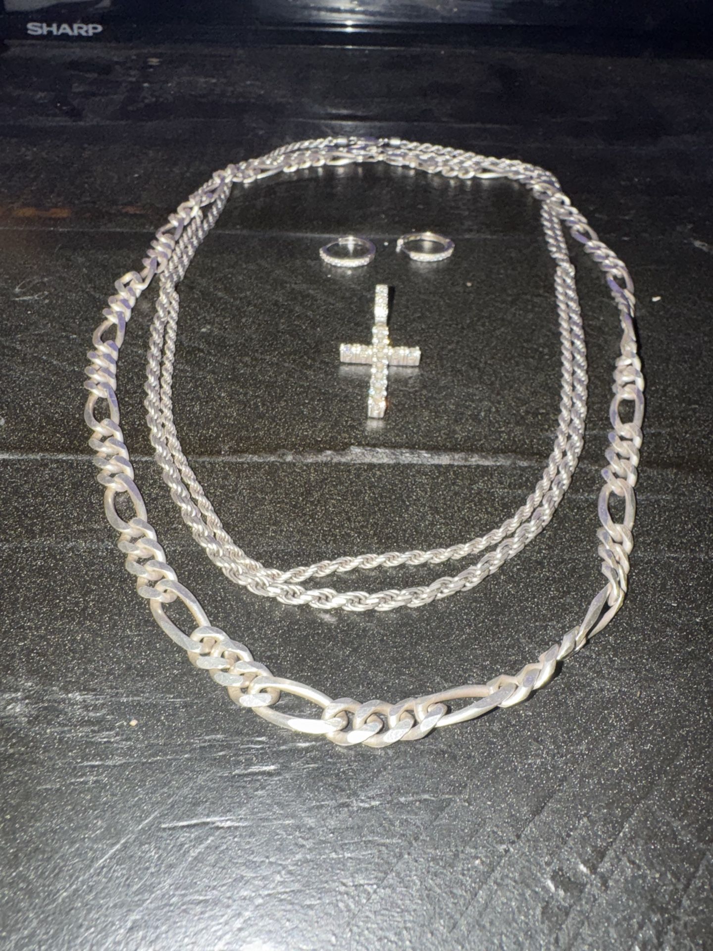 3 silver chains , pendant and earrings